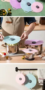 Multi-colored heat-resistant silicone lids demonstrated in a realistic kitchen setting