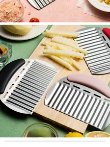 Handheld stainless steel crinkle cutter with colorful handles for wavy potato slices