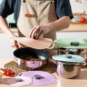 Multi-size silicone spill-proof pot lids for versatile kitchen cookware sets.