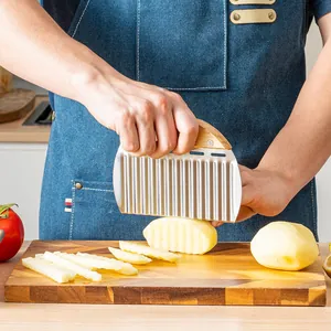 Stainless steel wavy potato cutter with ergonomic wooden handle for crinkle cut chips