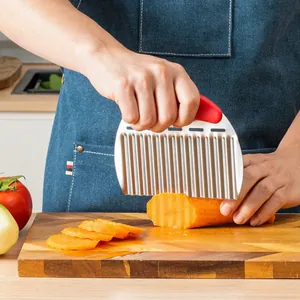 Stainless steel crinkle cutter for making wavy potato chips and vegetables.