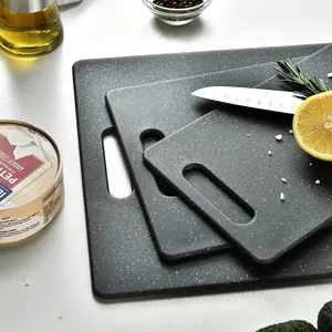 Premium 3-piece black speckled plastic cutting board set with non-slip texture and handles