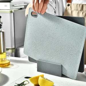 3-piece PP plastic cutting board set with marble texture and storage stand