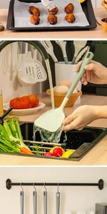 Macro view of a heat-resistant silicone spatula being washed and stored in a kitchen