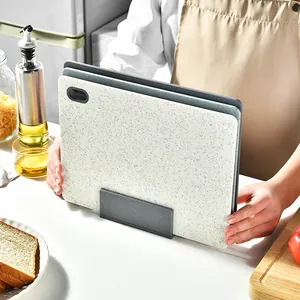 Professional 4-piece set of double-sided PP cutting boards with non-slip storage stand.