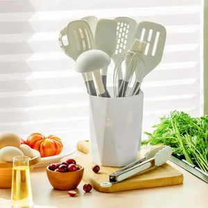 Premium 11-piece white silicone kitchen utensil set with holder in lifestyle kitchen
