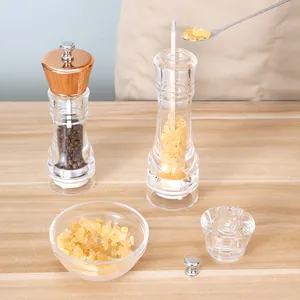 Manual acrylic pepper grinder with copper plated top for sea salt and spices