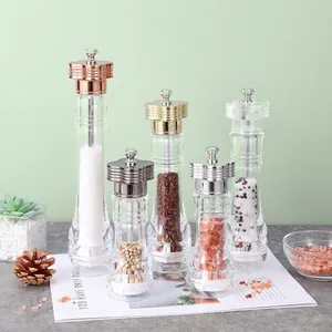Set of premium clear acrylic manual pepper and salt grinders with stylish metallic lids