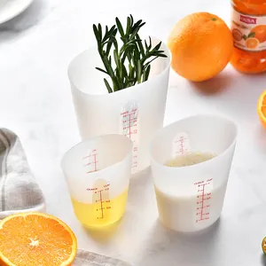 Set of 3 translucent silicone measuring cups with clear red ounce and cup scale markings