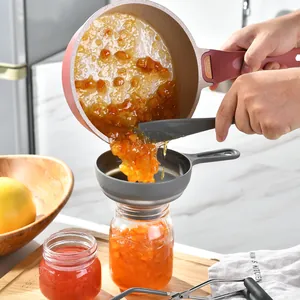 Lève-bocal de conserve professionnel en acier inox avec poignées antidérapantes