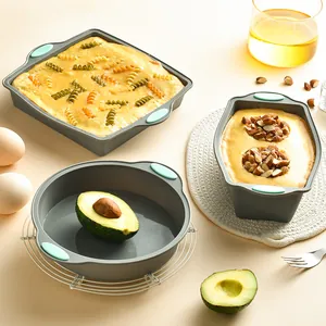 Set di stampi da forno in silicone resistente al calore con forme quadrate, tonde e rettangolari.