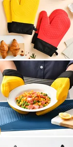 Durable heat-resistant silicone oven mitts with non-slip texture for safe kitchen baking.