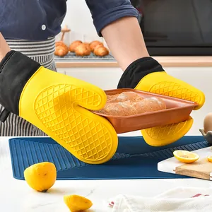 Thick yellow heat resistant silicone oven mitts with long canvas cuffs for kitchen baking