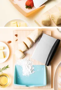 Professional stainless steel dough scraper and blue plastic bench scraper for baking.