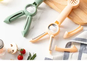 Detail view of 4-in-1 multi-functional vegetable peeler and bottle opener in soft peach