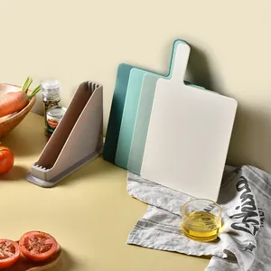 4-piece color-coded PP cutting board set with non-slip storage stand for kitchen use