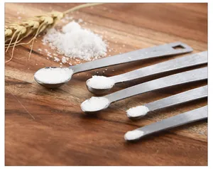 Detailed view of stainless steel mini measuring spoons set for kitchen seasoning and cooking
