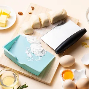 Stainless steel griddle scraper and light blue plastic tray set for professional baking dough