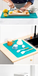 Vista dettagliata del grande tappetino in silicone per il drenaggio della cucina e calore