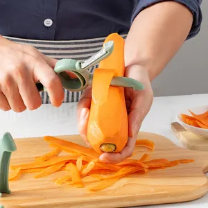 4-in-1 multi-functional green vegetable peeler and bottle opener tool peeling a carrot
