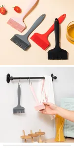 Integrated wide silicone oil brushes for BBQ and baking shown hanging on a kitchen rack