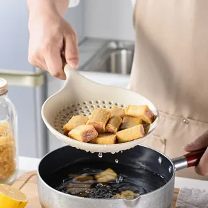Cream silicone slotted spoon skimmer for kitchen use draining fried tofu from pot