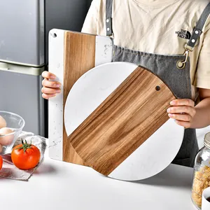 Modern marble and wood splicing cutting board for cheese, bread, and pizza serving
