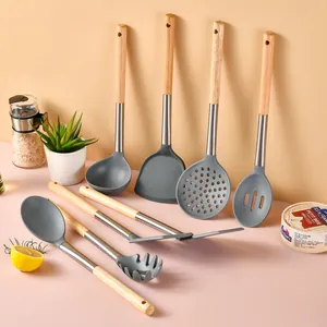 8-piece gray silicone kitchen utensil set with ergonomic oak wooden handles.