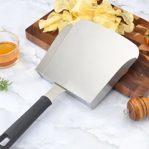 Durable stainless steel food scoop for chips and pizza on elegant marble background