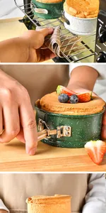 Close-up showing the springform latch release on a green non-stick cake baking pan