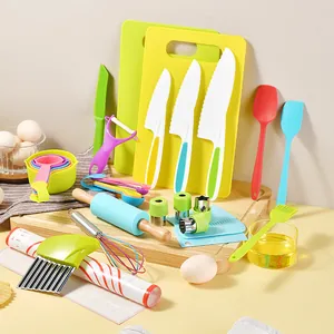 Complete colorful children's cooking and baking tool set with plastic knives and boards