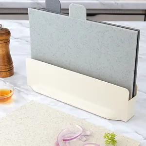 Categorized 3-piece plastic cutting board set with a vertical storage stand