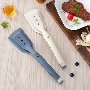 Pince spatule de cuisine 2 en 1 en silicone résistante à la chaleur pour steaks et BBQ