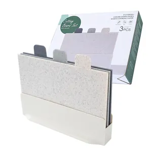 Set of 3 color-coded kitchen cutting boards with a vertical storage holder stand