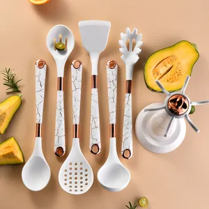 Premium 7-piece white silicone kitchen utensil set with marble handles and storage rack