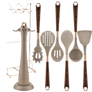 7-piece silicone kitchen utensil set with wood-grain handles and storage stand