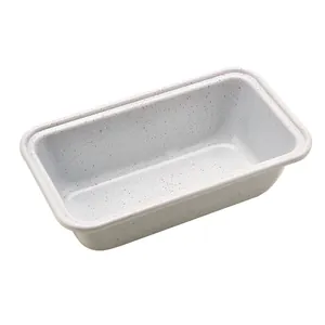 Non-stick carbon steel loaf pan with pink speckle pattern for baking bread and cakes