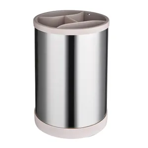 Rotating stainless steel kitchen utensil holder with three compartments for organized cutlery