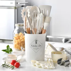 Comprehensive 34-piece cream silicone kitchen utensil set with elegant wooden handles