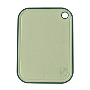 Eco-friendly wheat straw double-sided cutting board with integrated garlic grinder