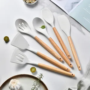 Professional 6-piece white silicone kitchen utensil set with natural ergonomic wooden handles