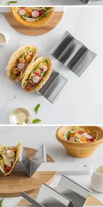Close-up of W-shaped stainless steel taco holder with tacos in a kitchen setting