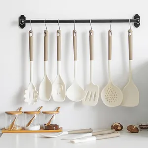 Complete 10-piece heat resistant silicone kitchen utensil set in cream and taupe colors