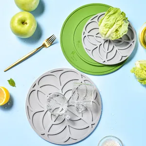 Round heat-resistant silicone dining table mats with decorative clover pattern in green and grey