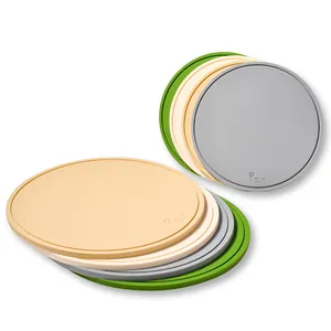 Set of round heat-resistant silicone placemats featuring a four-leaf clover design