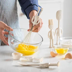 Creative 5-piece silicone baking tool set with humanoid handles including whisk and spatula