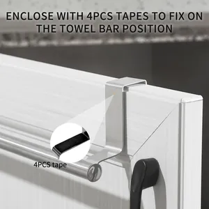 Close-up of over-the-door towel bar showing adhesive tape for secure fixing