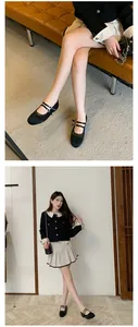 Eleganti ballerine Mary Jane bicolore stile francese con doppio cinturino e punta tonda.