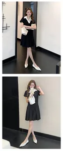 Elegant white pointed-toe flats with buckle for women's summer commute, full body view.
