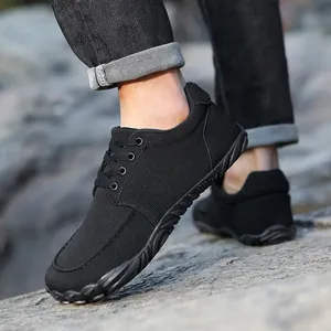 Minimalist black fly-knit lace-up leisure sneakers for men outdoor walking shoes